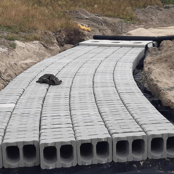 Bufferblock onder fietspad Parkwal Wilgenrijk Maassluis | Noppert Beton