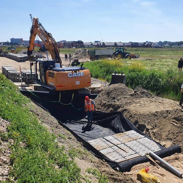 Bufferblock onder fietspad Parkwal Wilgenrijk Maassluis | Noppert Beton